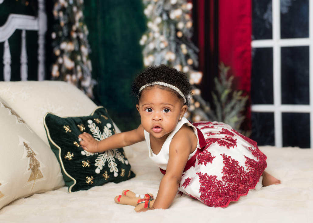 Holiday Gift Ideas Christmas picture of baby on a bed