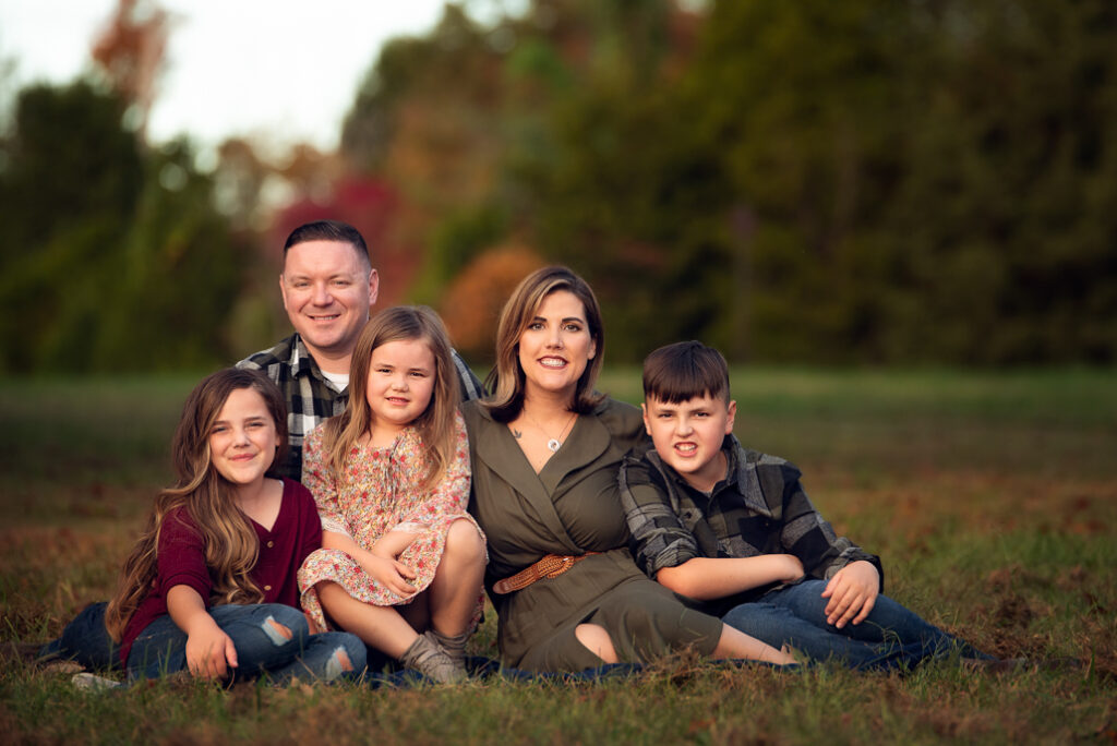 Fall family photo outfits Birmingham with warm coordinated autumn colors