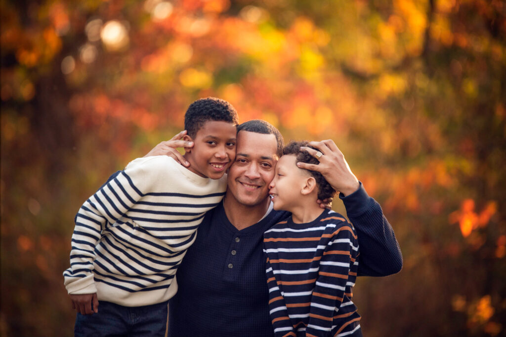 Fall family photo outfits Birmingham with dad and boys in striped sweaters