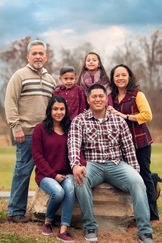 Large fall family photo in Birmingham with multiple generations in burgundy and neutral tones